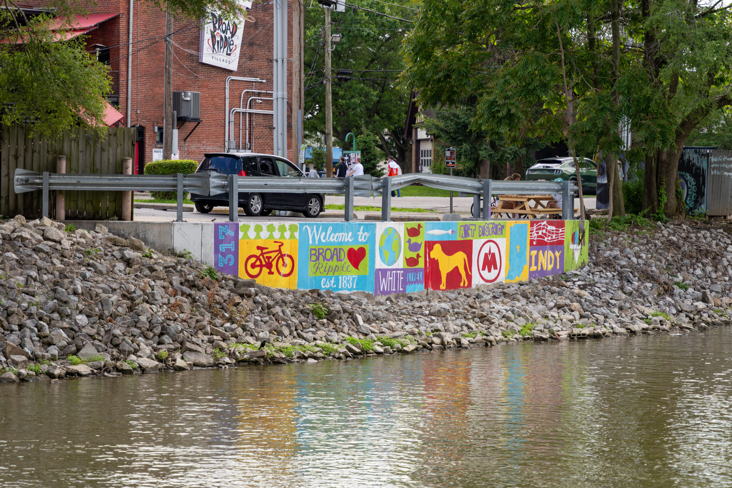 Exterior picture of a mural along the canal in Broad Ripple