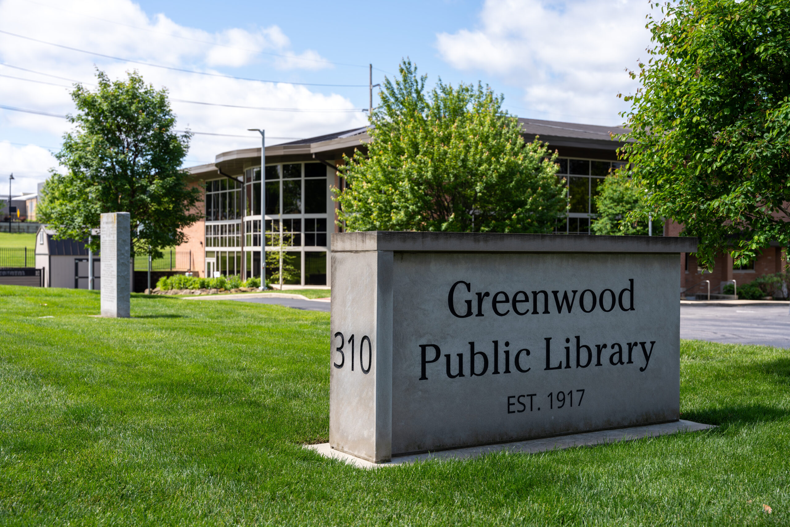 Exterior sign for the Greenwood Public Library in Greenwood, Indiana