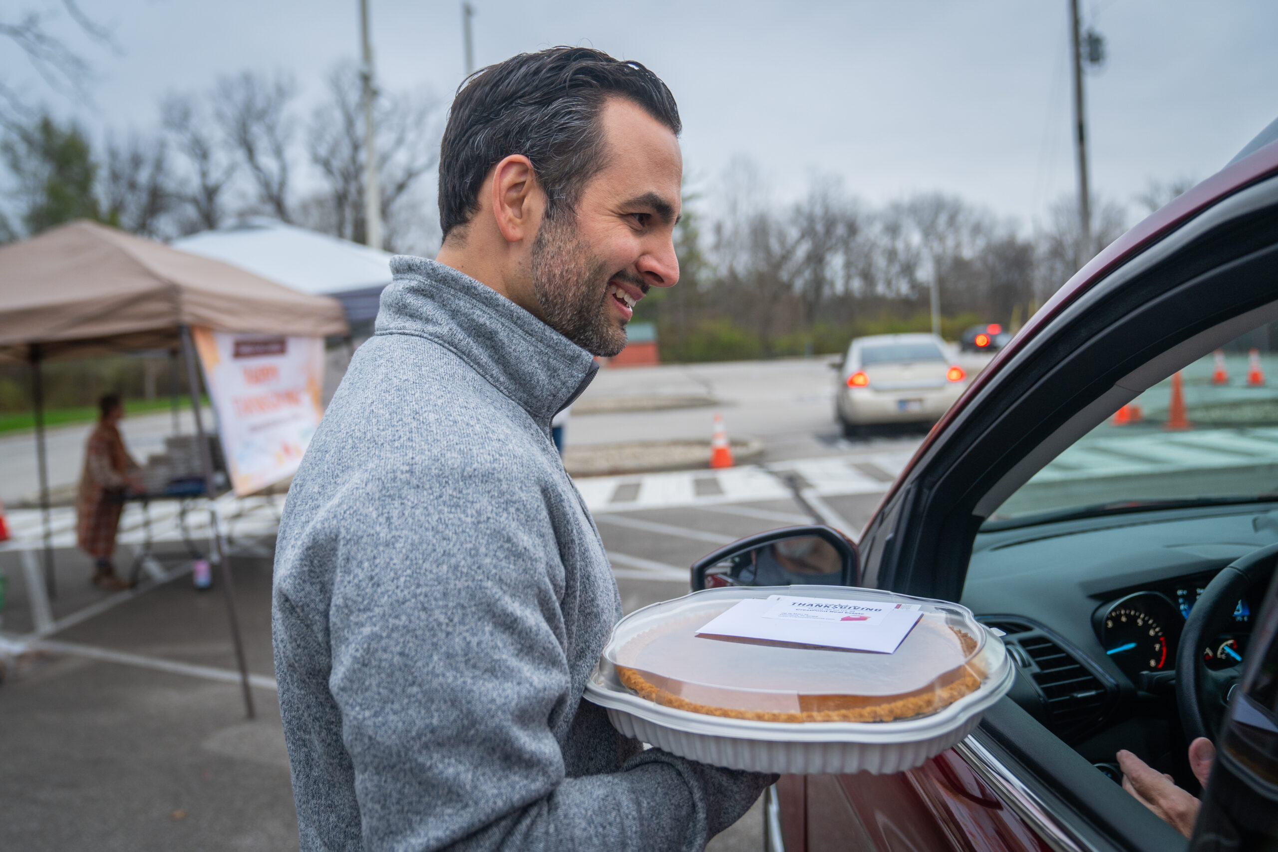 Picture of Paul Gorrell hand delivering pumpkin pies